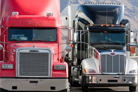 Speed Limiting Devices Proposed for Large Trucks and Buses - Spivey Law Firm, Personal Injury Attorneys, P.A.