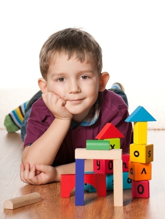 Boy with toys - Spivey Law Firm, Personal Injury Attorneys, P.A.