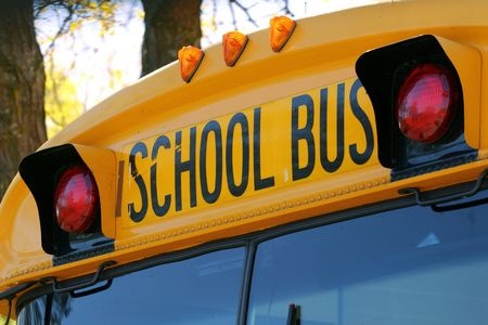 Passing Stopped School Buses Puts Kids in Danger and Is Illegal - Spivey Law Firm, Personal Injury Attorneys, P.A.