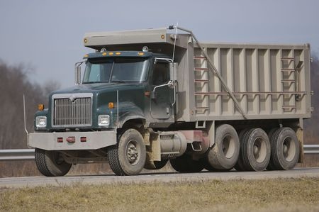 Dump Trucks Look Heavy & They Are Heavy - Spivey Law Firm, Personal Injury Attorneys, P.A.