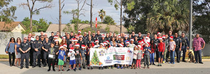 Spivey Law Firm Announces Support for Cape Coral Police "Cops and Kids" Holiday Shopping Program